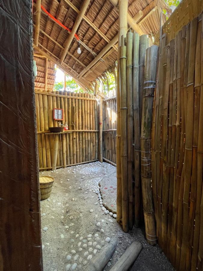 Tribal Huts Community Vandrarhem Daanbantayan Rum bild
