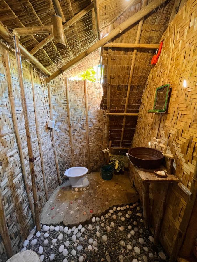 Tribal Huts Community Vandrarhem Daanbantayan Exteriör bild