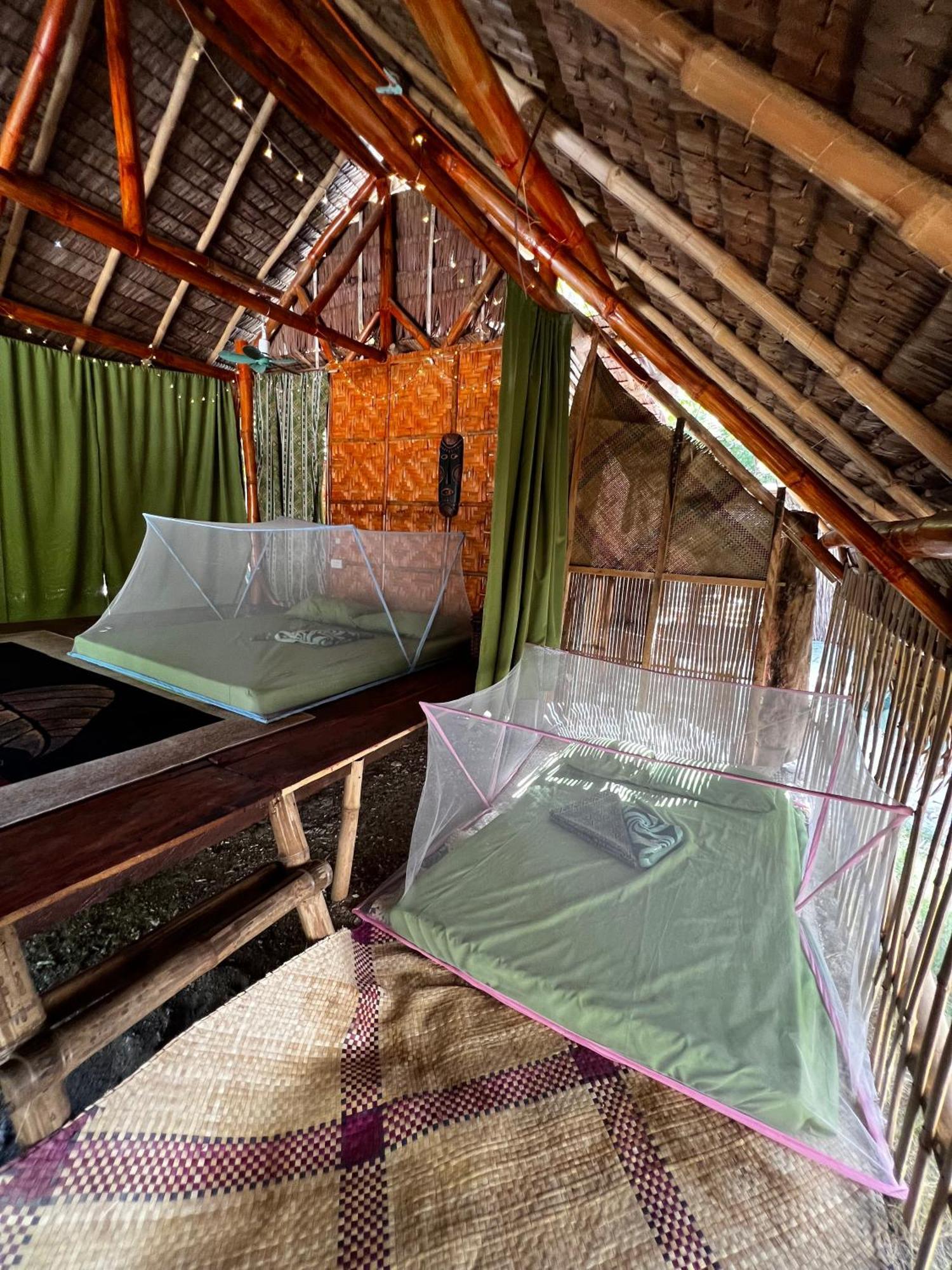 Tribal Huts Community Vandrarhem Daanbantayan Exteriör bild