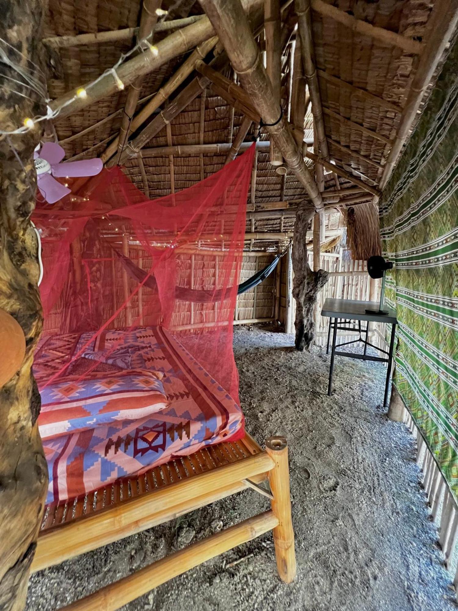 Tribal Huts Community Vandrarhem Daanbantayan Exteriör bild