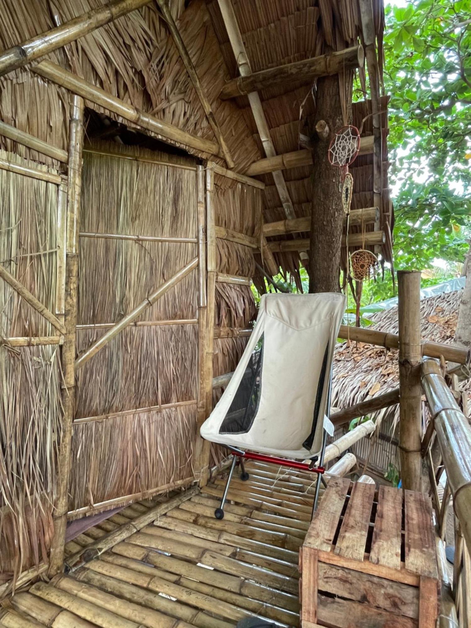 Tribal Huts Community Vandrarhem Daanbantayan Rum bild